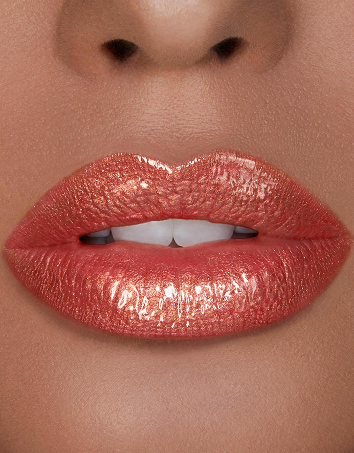 Hourglass Unreal™ High Shine Volumizing -  Lip Gloss - stre